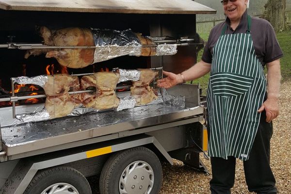 Mobile wood fired hog roast machine